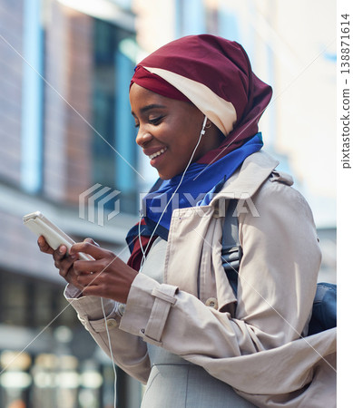 Phone, black woman travel or music in city on headphones for social media, motivation or mindset. Happy student girl on smartphone radio, listening or streaming audio podcast outdoor on urban street Phone, black woman travel or music in city on headphones for social media, motivation or mindset. Happy student girl on smartphone radio, listening or streaming audio podcast outdoor on urban street 138871614