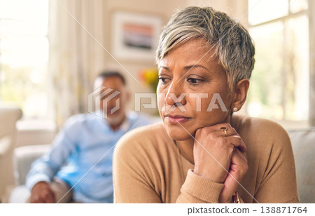 Divorce, senior woman and fight or sad in marriage in living room with partner or angry in home. Problem, upset and female person with conflict on sofa with couple or breakup and frustrated together. Divorce, senior woman and fight or sad in marriage in living room with partner or angry in home. Problem, upset and female person with conflict on sofa with couple or breakup and frustrated together. 138871764