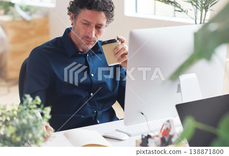 Writing, planning or graphic designer man on computer for creative research, planning web strategy or branding. Startup office or employee at desk working on notebook, SEO calendar schedule or agenda Writing, planning or graphic designer man on computer for creative research, planning web strategy or branding. Startup office or employee at desk working on notebook, SEO calendar schedule or agenda 138871800