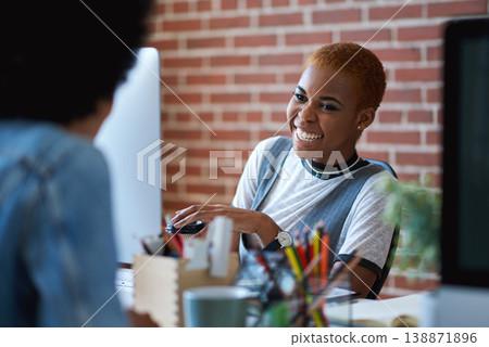 Black woman, laughing and employees in creative business agency, startup and trendy company. Happy female worker smile at desk for collaboration, funny conversation and talking with friends in office Black woman, laughing and employees in creative business agency, startup and trendy company. Happy female worker smile at desk for collaboration, funny conversation and talking with friends in office 138871896