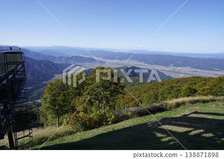 View towards Muikamachi from the summit station of the Hakkaisan Ropeway in Uonuma City, Niigata Prefecture. October 23, 2025. 138871898