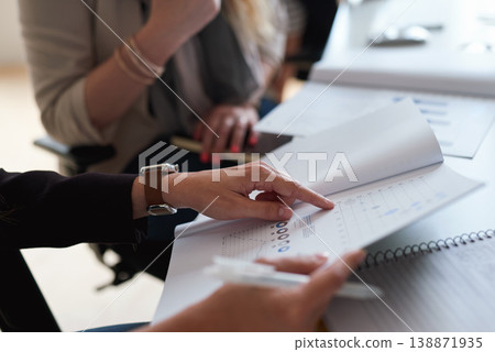 Finance, stats and hands of a business person with a report in a meeting for investment and growth. Teamwork, data and employees reading a financial document with data, graph and economy analysis Finance, stats and hands of a business person with a report in a meeting for investment and growth. Teamwork, data and employees reading a financial document with data, graph and economy analysis 138871935