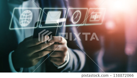 Business man, phone in hands and app, technology abstract with hologram, communication and 3D. Digital overlay, clock and email with internet, mockup and futuristic with connectivity and wifi to chat Business man, phone in hands and app, technology abstract with hologram, communication and 3D. Digital overlay, clock and email with internet, mockup and futuristic with connectivity and wifi to chat 138872066