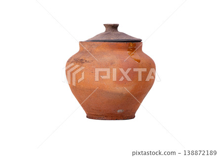 Rustic Clay Pitcher with Handle Isolated on White. Antique Rustic earthenware jug with Aged Terracotta surface Rustic Clay Pitcher with Handle Isolated on White. Antique Rustic earthenware jug with Aged Terracotta surface 138872189