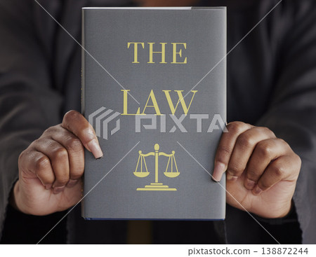 Hands, woman or judge with book, constitution research or education for learning the justice system. Lawyer, advocate or closeup of attorney studying knowledge, guide or information for legal agency Hands, woman or judge with book, constitution research or education for learning the justice system. Lawyer, advocate or closeup of attorney studying knowledge, guide or information for legal agency 138872244