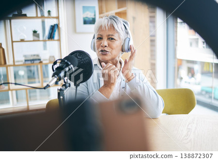 Senior woman with podcast, host on broadcast or social media influencer with mic, headphones and home studio. Technology, communication and online radio show, live streaming with female web presenter 138872307