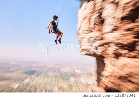 Sports, rock climbing and jump with woman on mountain for fitness, adventure and challenge. Fearless, workout and hiking with person training on cliff for travel, freedom and exercise mockup Sports, rock climbing and jump with woman on mountain for fitness, adventure and challenge. Fearless, workout and hiking with person training on cliff for travel, freedom and exercise mockup 138872341