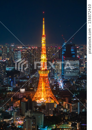 The illuminated Tokyo Tower and the night view of the metropolis as seen from Roppongi Hills in Minato Ward, Tokyo. The illuminated Tokyo Tower and the night view of the metropolis as seen from Roppongi Hills in Minato Ward, Tokyo. 138872410