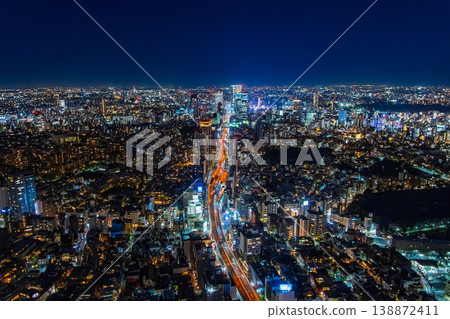 Night view of Shibuya and the light trails of the Metropolitan Expressway from the observation deck of Roppongi Hills in Minato Ward, Tokyo. 138872411