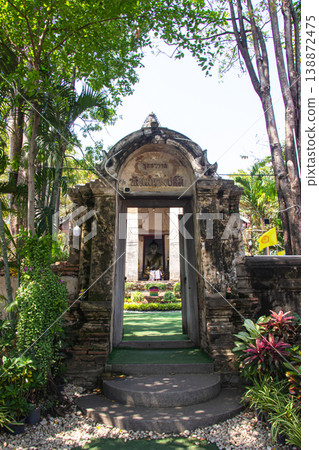 Ancient gate entrance of antique temple Wat Nang Pluem for thai people traveler visit and respect praying blessing buddha worship in Ayutthaya province, Thailand. Ancient gate entrance of antique temple Wat Nang Pluem for thai people traveler visit and respect praying blessing buddha worship in Ayutthaya province, Thailand. 138872475