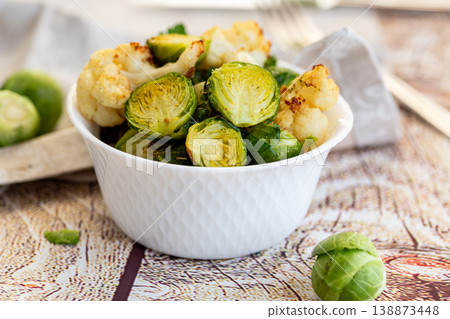 healthy roasted vegetables with brussels sprouts in bowl healthy roasted vegetables with brussels sprouts in bowl 138873448