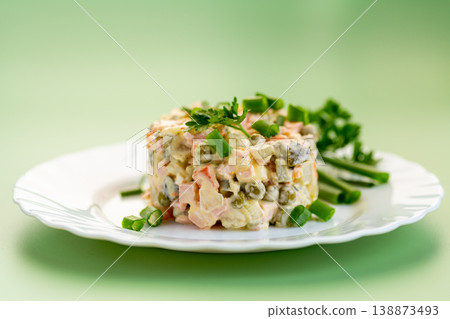 delicious creamy potato salad with peas carrots and green onion 138873493