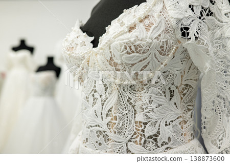 Intricate lace wedding dress details on mannequins National Wedding Month, National Lace Day Intricate lace wedding dress details on mannequins National Wedding Month, National Lace Day 138873600