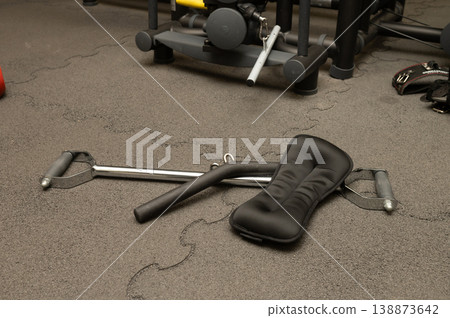 Gym equipment close-up: fitness station with pull-up bar and cushioned pad 138873642