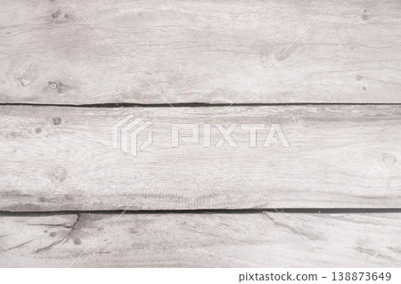 Wooden planks arranged horizontally on pale floor surface Wooden planks arranged horizontally on pale floor surface 138873649