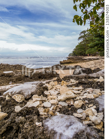 The beautiful aerial view of the morning on the beach with blue sea water in Kaur, Bengkulu, Indonesia The beautiful aerial view of the morning on the beach with blue sea water in Kaur, Bengkulu, Indonesia 138874003