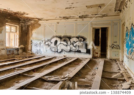 Vacant building interior. Abandoned hall showing wear and neglect Vacant building interior. Abandoned hall showing wear and neglect 138874409