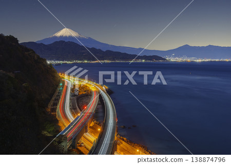 Mount Fuji at Blue Hour with Light Trails from Satta-Toge Pass in Shizuoka Japan Mount Fuji at Blue Hour with Light Trails from Satta-Toge Pass in Shizuoka Japan 138874796