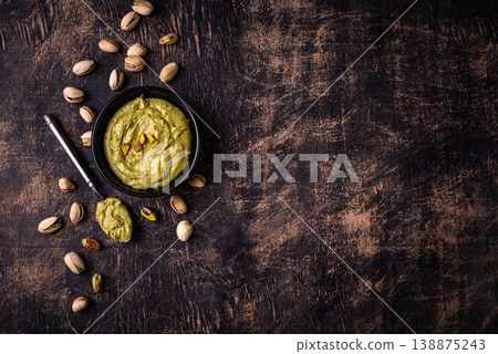 Sweet pistachio cream in a bowl 138875243