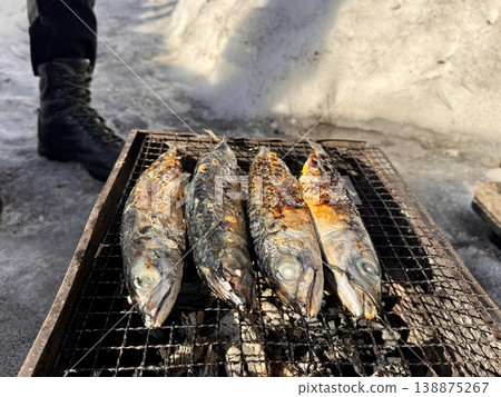 the process of roasting juicy and spiced fresh mackerel on a grill, mackerel on coals on a grill recipe the process of roasting juicy and spiced fresh mackerel on a grill, mackerel on coals on a grill recipe 138875267