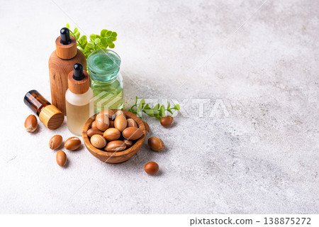 Moroccan argan seeds and oil for hair care Moroccan argan seeds and oil for hair care 138875272
