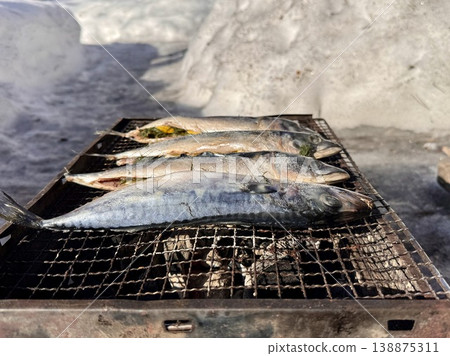 the process of roasting juicy and spiced fresh mackerel on a grill, mackerel on coals on a grill recipe the process of roasting juicy and spiced fresh mackerel on a grill, mackerel on coals on a grill recipe 138875311