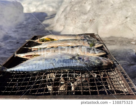 the process of roasting juicy and spiced fresh mackerel on a grill, mackerel on coals on a grill recipe the process of roasting juicy and spiced fresh mackerel on a grill, mackerel on coals on a grill recipe 138875323