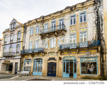 Tomar, Portugal - Mar 11, 2026: A charming cobblestone street in Tomar, Portugal. Tomar, Portugal - Mar 11, 2026: A charming cobblestone street in Tomar, Portugal. 138875395