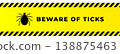 Yellow and black warning banner sign with tick insect silhouette and beware of ticks text with hazard stripes 138875463
