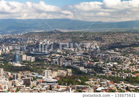 Expansive aerial view of Tbilisi city on a cloudy day 138875611