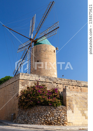 An old stone windmill with wooden sails, Malta An old stone windmill with wooden sails, Malta 138875621