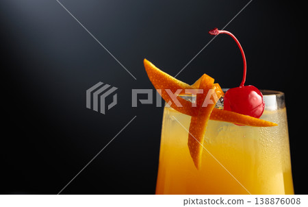 Cocktail Tequila sunrise with orange juice, silver tequila, grenadine, and ice. Cocktail Tequila sunrise with orange juice, silver tequila, grenadine, and ice. 138876008