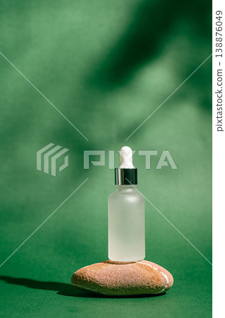 A frosted dropper bottle of facial serum A frosted dropper bottle of facial serum 138876049