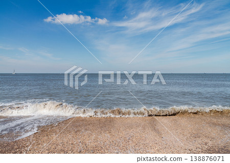 Sea waves on sandy beach in The Hague Netherlands 138876071