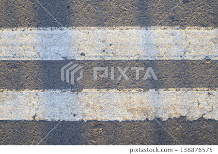 The asphalted road with two continuous white strips. The highway with a white marking. 138876575
