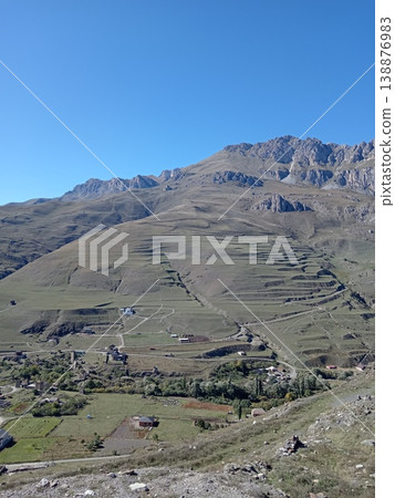 Ruins of the signal tower of Kurta and Taga, North Ossetia, Russia. Historic stone structure remnants on a hillside, once used for defensive communication Ruins of the signal tower of Kurta and Taga, North Ossetia, Russia. Historic stone structure remnants on a hillside, once used for defensive communication 138876983