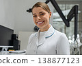 Female doctor smiling and looking at camera 138877123