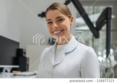 Female doctor smiling and looking at camera 138877123