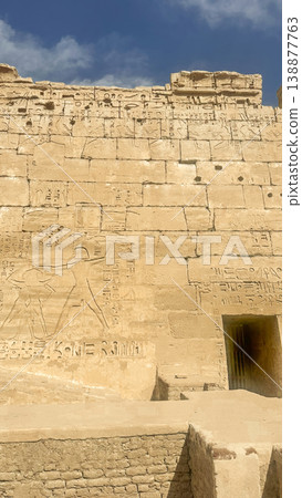 Medinet Habu, the mortuary temple of Ramesses III, located on the west bank of Luxor, Egypt. 138877763