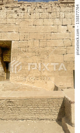 Medinet Habu, the mortuary temple of Ramesses III, located on the west bank of Luxor, Egypt. Medinet Habu, the mortuary temple of Ramesses III, located on the west bank of Luxor, Egypt. 138877764