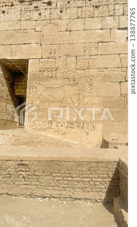 Medinet Habu, the mortuary temple of Ramesses III, located on the west bank of Luxor, Egypt. 138877765