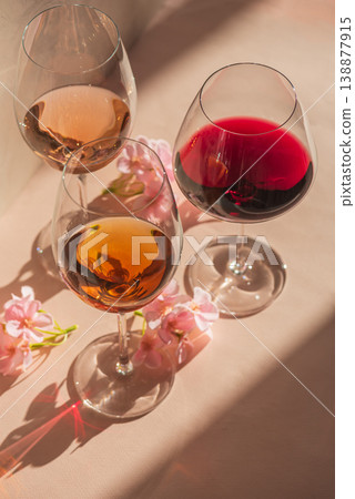 Three Wine Glasses with Rose, White and Red Wine. 138877915