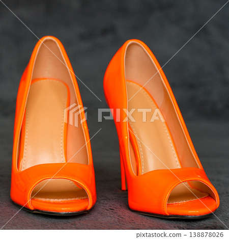 Sexy bright orange open toe high heels elegant stiletto shoes modern fashion footwear pair Sexy bright orange open toe high heels elegant stiletto shoes modern fashion footwear pair 138878026