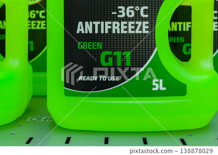 Green antifreeze coolant G11 ready to use -36C 5L container automotive fluid on store shelf Green antifreeze coolant G11 ready to use -36C 5L container automotive fluid on store shelf 138878029
