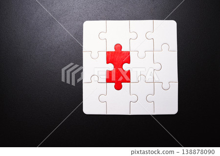 Red puzzle piece completing the jigsaw 138878090