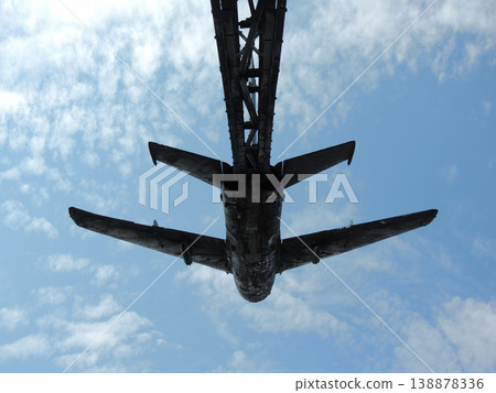 Monument of an old jet fighter at war museum. Bottom point of view Monument of an old jet fighter at war museum. Bottom point of view 138878336