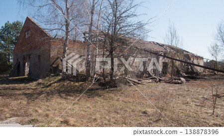 Derelict Masonry Complex With Collapsed Roof, Broken Walls, Scattered Rubble, Dry Scrub And Grass, Leaning Derelict Masonry Complex With Collapsed Roof, Broken Walls, Scattered Rubble, Dry Scrub And Grass, Leaning 138878396