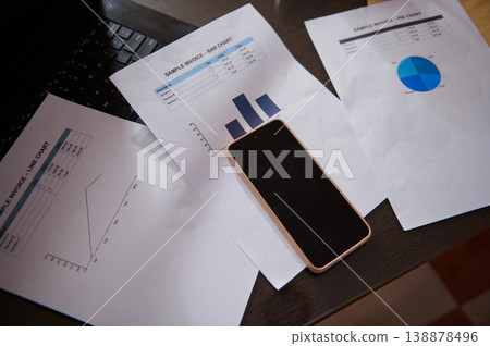 Business Documents, Smartphone and Financial Charts on Desk for Office Analysis 138878496