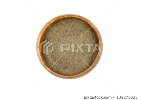 Ground black pepper spice in a wooden bowl isolated on white background. Top view, close-up Ground black pepper spice in a wooden bowl isolated on white background. Top view, close-up 138878628