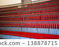 Empty Historical Lecture Hall with Tiered Red Seating 138878715